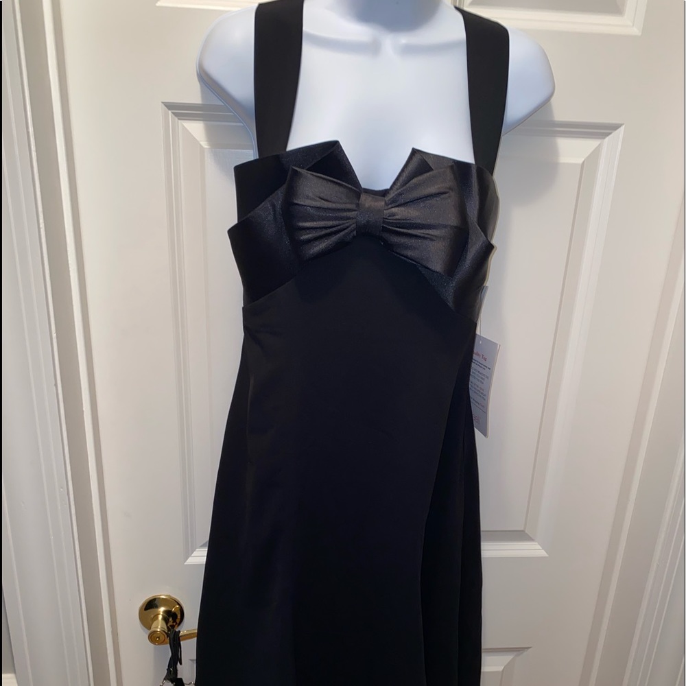Beautiful satin bow slip dress. Brand new with tags.